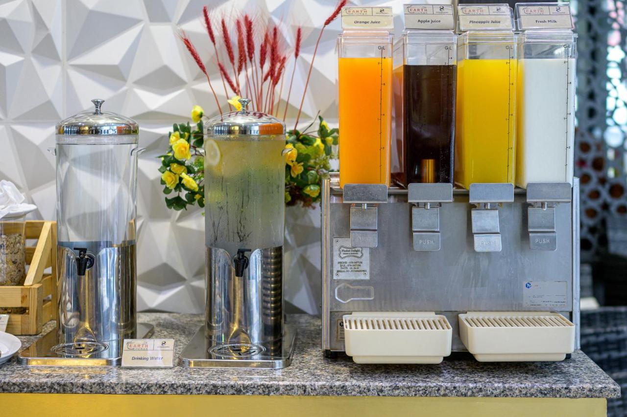 泽希纳水疗度假村【SHA Extra Plus】 Patong 外观 照片 Juice dispensers