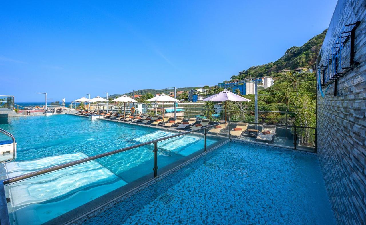 泽希纳水疗度假村【SHA Extra Plus】 Patong 外观 照片 The swimming pool at the hotel