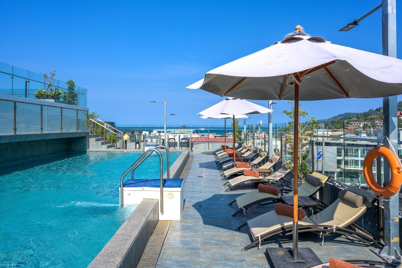 泽希纳水疗度假村【SHA Extra Plus】 Patong 外观 照片 Rooftop pool at the hotel