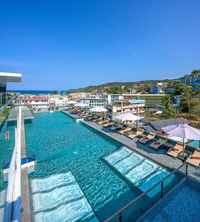 泽希纳水疗度假村【SHA Extra Plus】 Patong 外观 照片 The swimming pool at the hotel