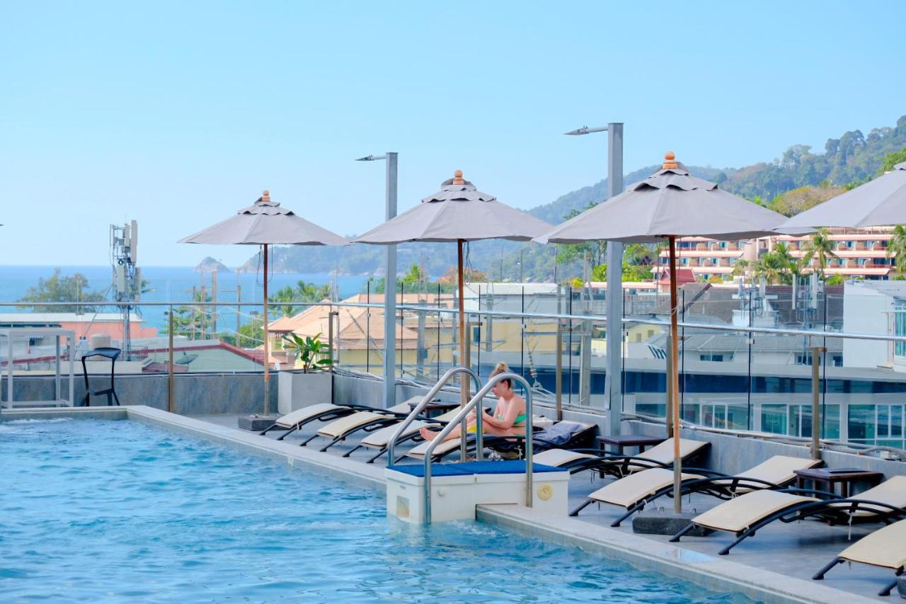 泽希纳水疗度假村【SHA Extra Plus】 Patong 外观 照片 Rooftop pool at the hotel