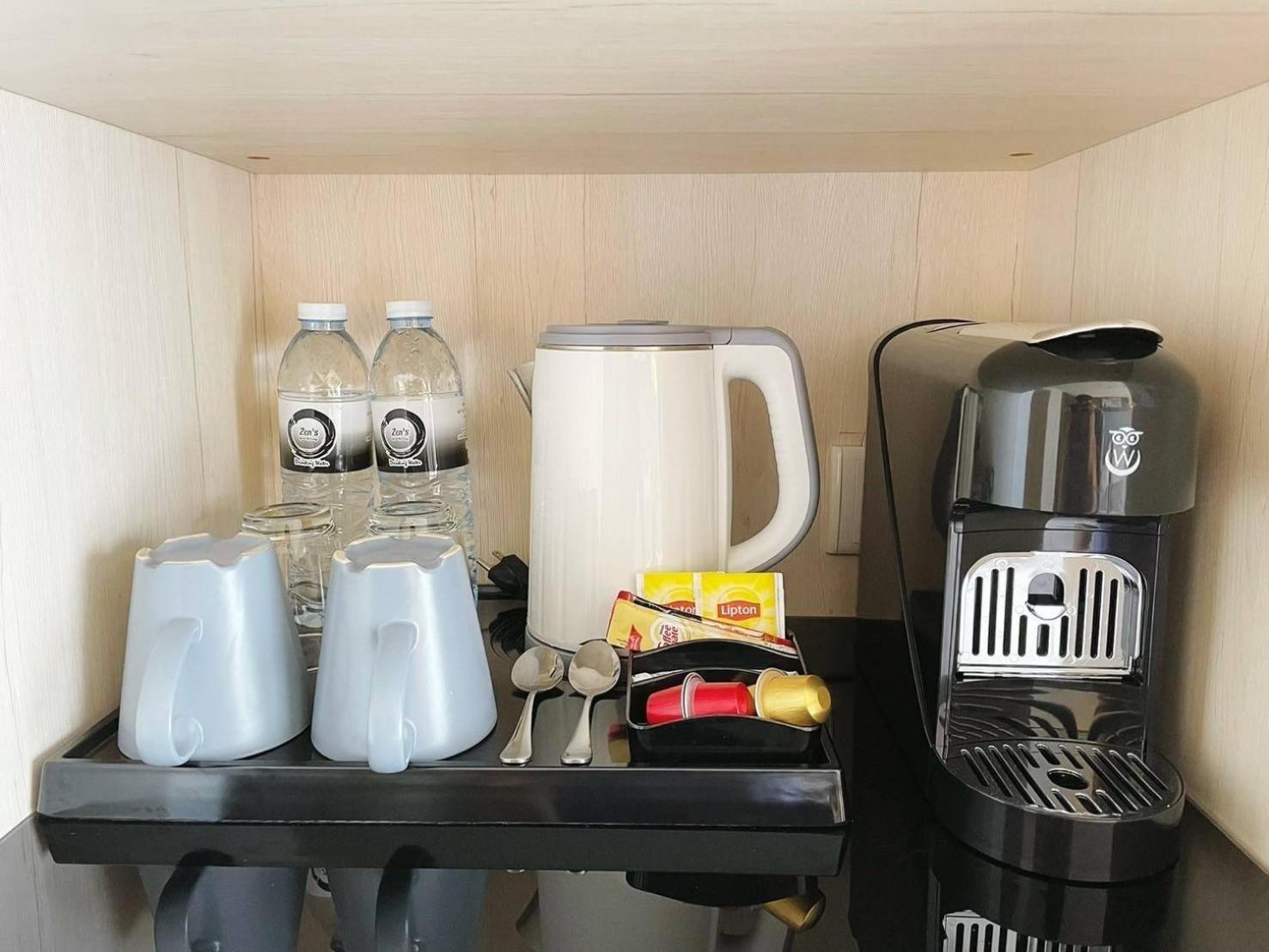 泽希纳水疗度假村【SHA Extra Plus】 Patong 外观 照片 A Nespresso machine in a hotel room